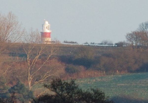 Top of the Orfordness lighthouse as seen from the edge of Rendlesham Forest