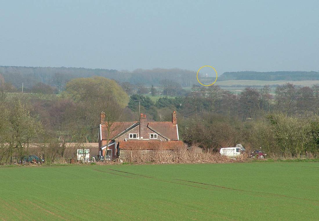 Orford Ness lighthouse seen from the edge of Rendlesham Forest