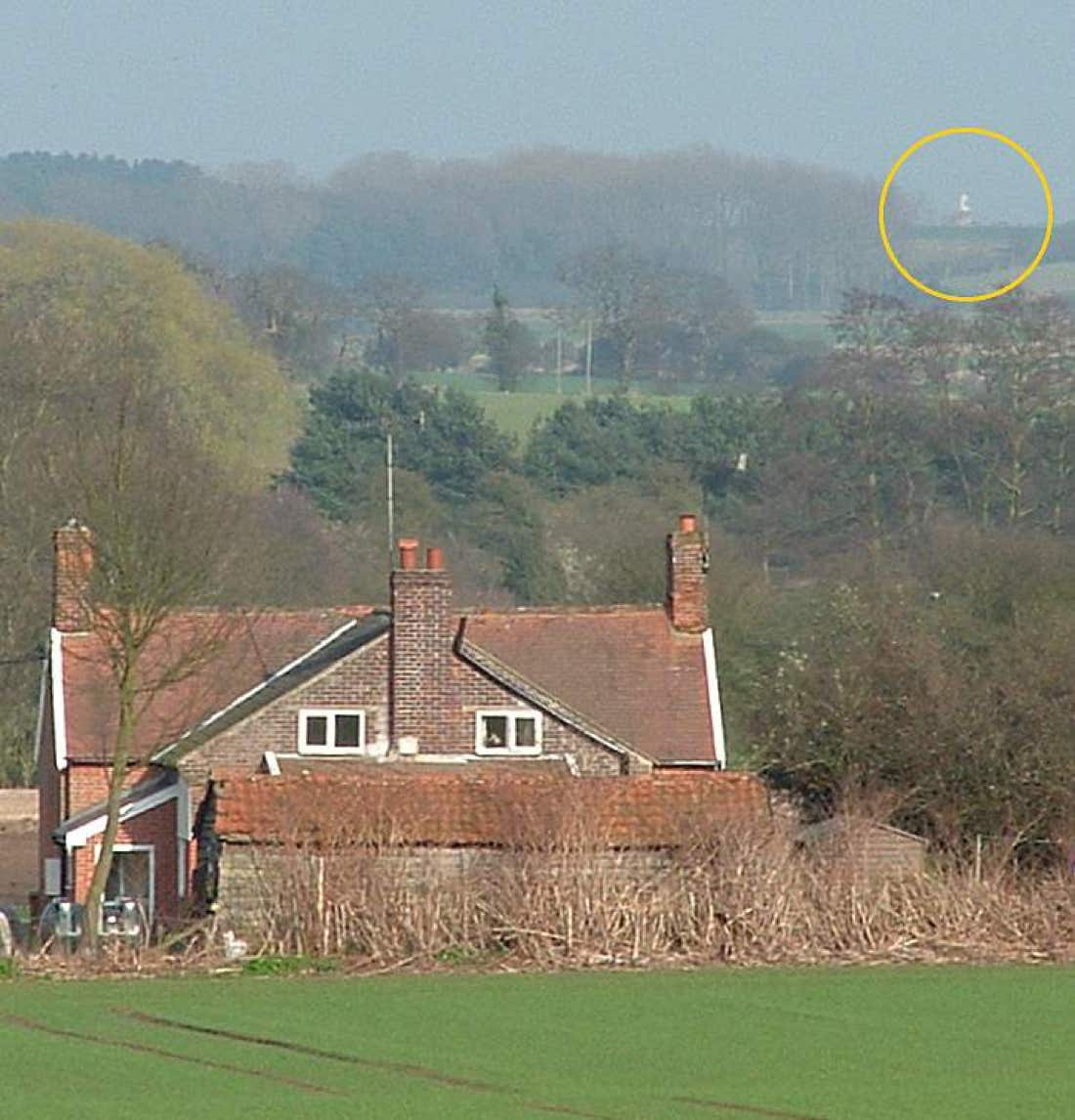 Orford Ness lighthouse seen from the edge of Rendlesham Forest